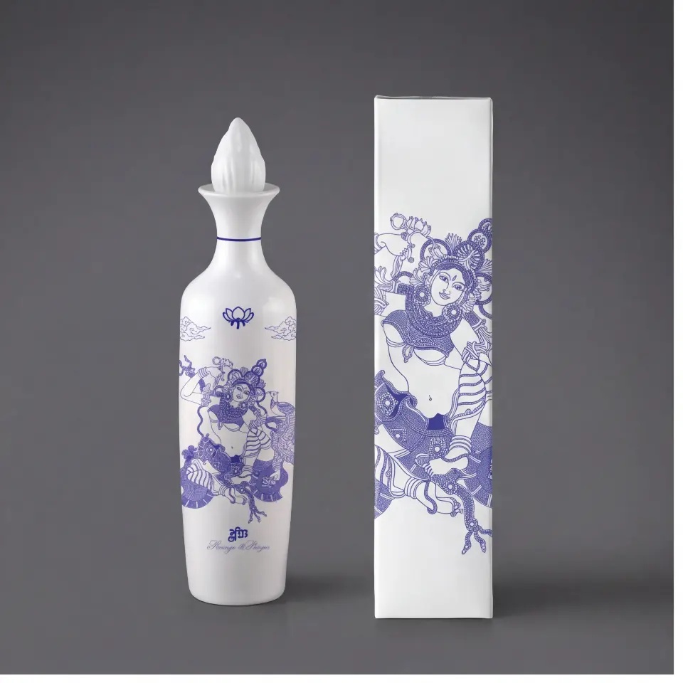 Lotus Gin white ceramic bottle with cobalt blue lotus line artwork and cork stopper